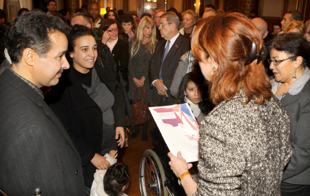 Bougrine et Najat Amellal recevant leurs décrets des mains du préfet Sophie Thibault en présence de Shamira Kasri, adjointe au maire de Brive