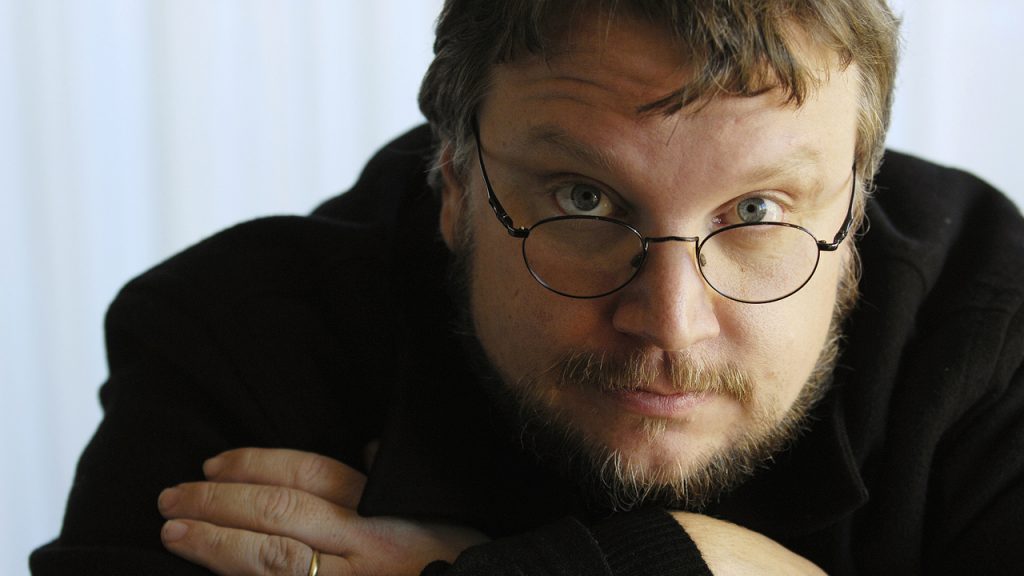 Guillermo Del Toro poses in Beverly Hills, California, in this December 18, 2006 file photo. The filmmaker who was directing two movies based on J.R.R. Tolkien's "The Hobbit" has stepped down after two years on the project amid studio delays and schedule conflicts. REUTERS/Chris Pizzello/Files (UNITED STATES - Tags: ENTERTAINMENT PROFILE)